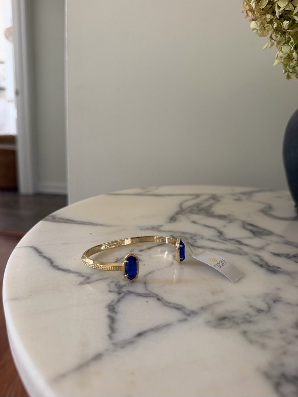 Gold Tone Bangle Bracelet with Blue Stone Accents KENDRA Scott